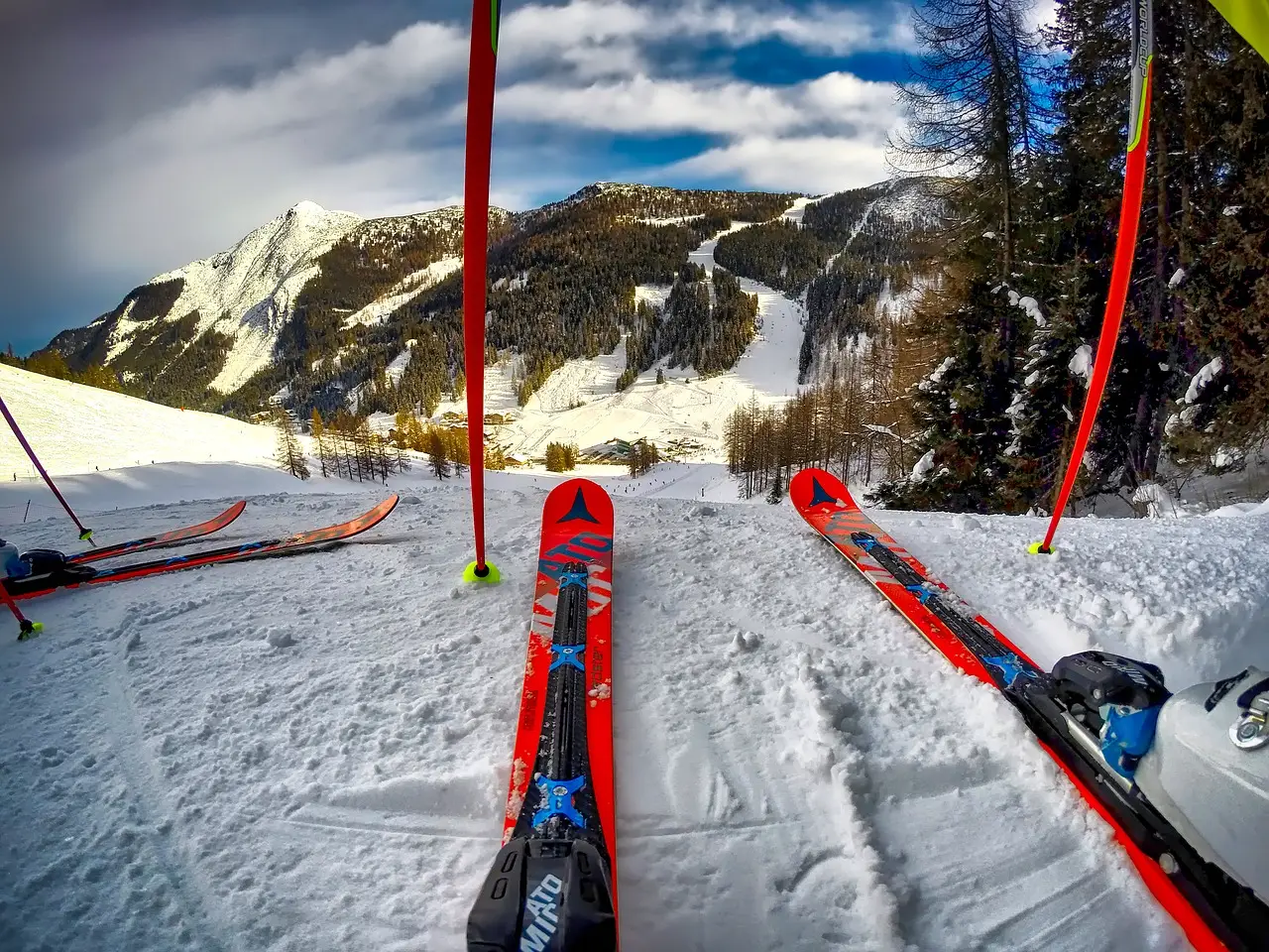 Vučići in Croatia - a group of ski poles sitting on top of a snow covered slope.
