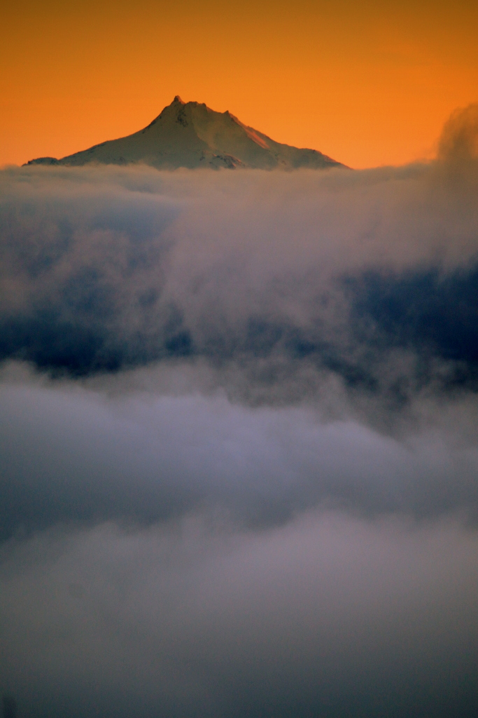 Timberline in USA - a view of a mountain covered in clouds.