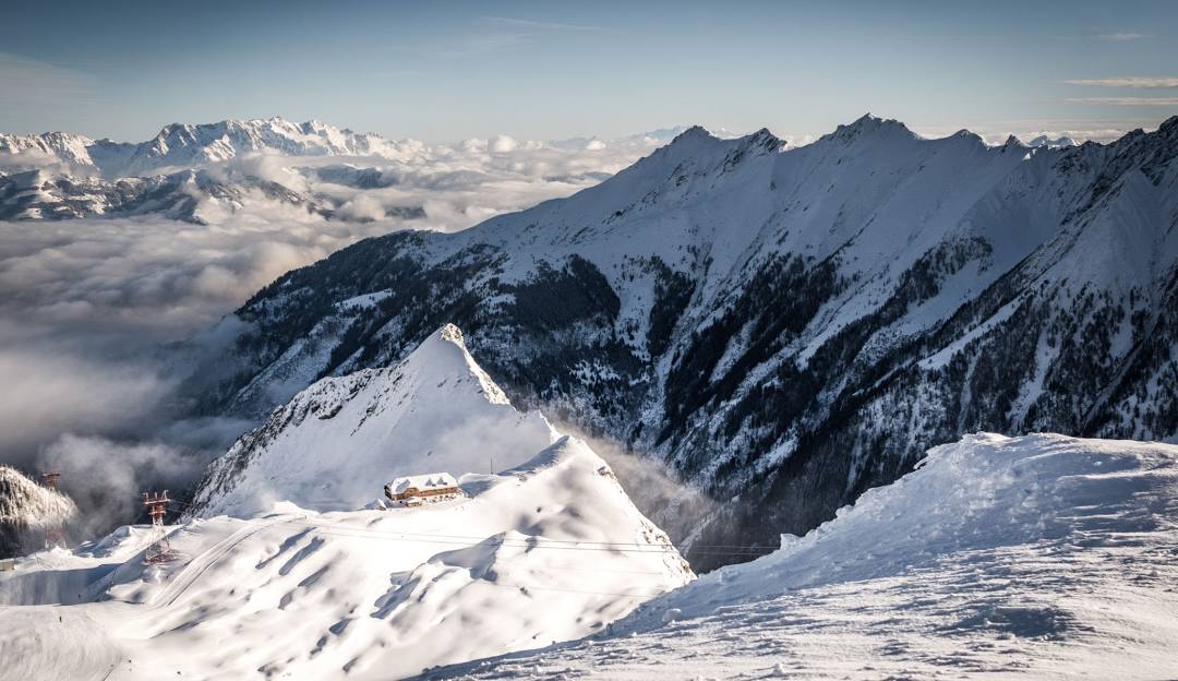 Kitzsteinhorn in Austria - a view from the top of a snowy mountain.
