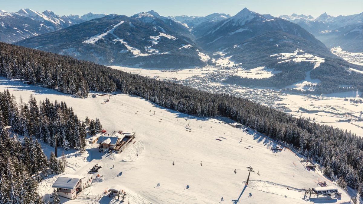 Monte Popolo – Eben im Pongau in Austria: an aerial view of a ski resort in the french alps.