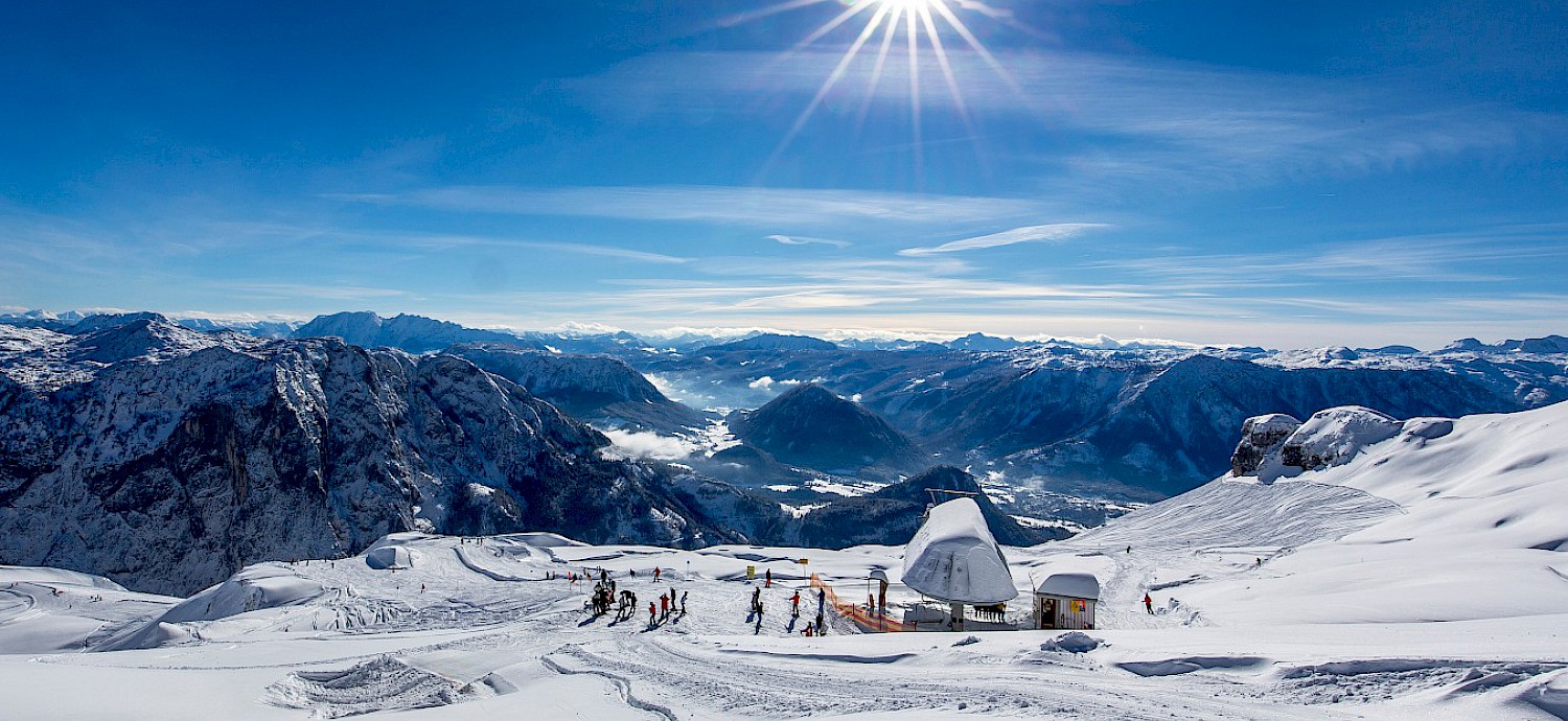 Loser Bergbahnen in Austria - a group of people standing on top of a mountain.
