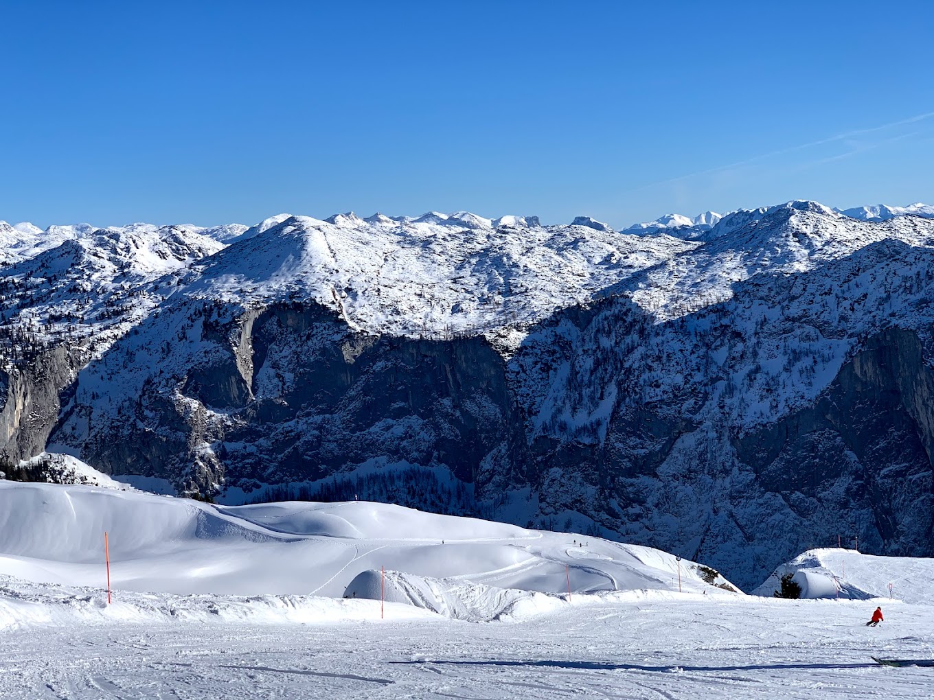 Loser Bergbahnen in Austria - a person standing on top of a snow covered mountain.