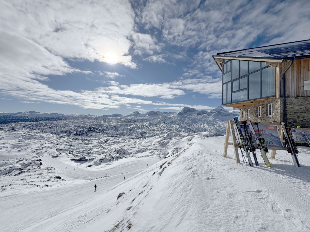 Hallstatt in Austria - a view from the top of a snowy mountain.