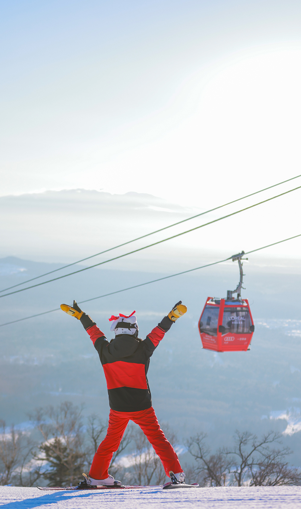 Changbaishan Wanda in China - a person on a snowboard in the snow.