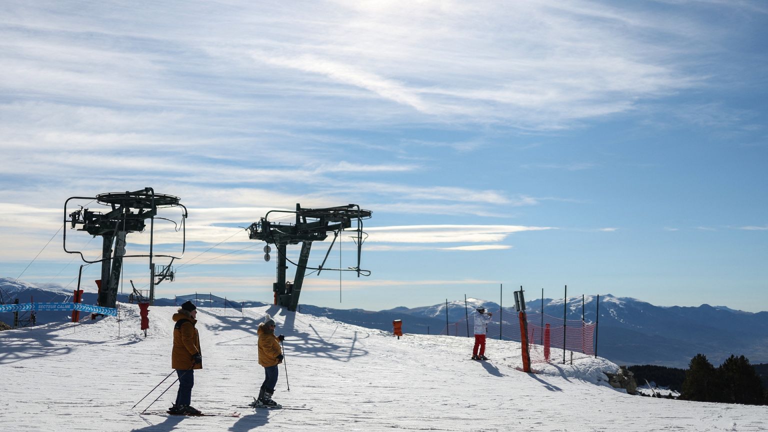 Font-Romeu | ​Bolquère Pyrénées 2000 in France - a person standing in the snow on a ski slope.
