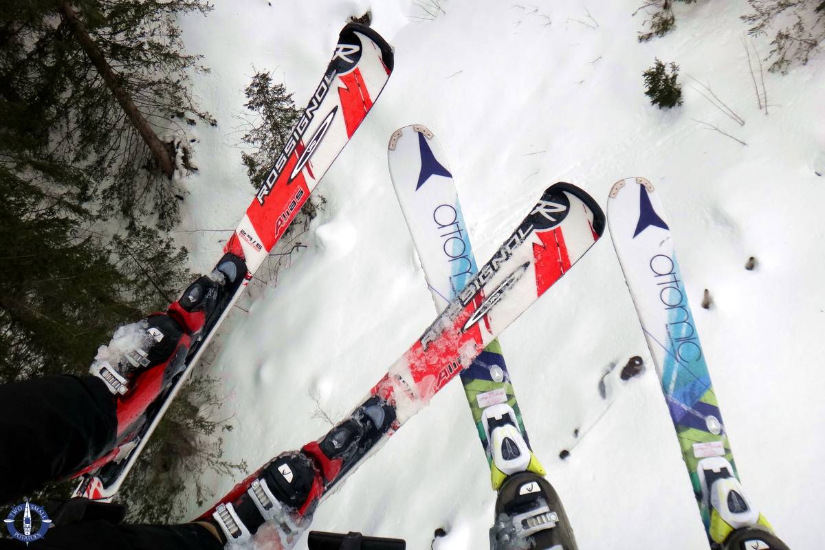 Charmey in Switzerland - a group of skiers standing in the snow.