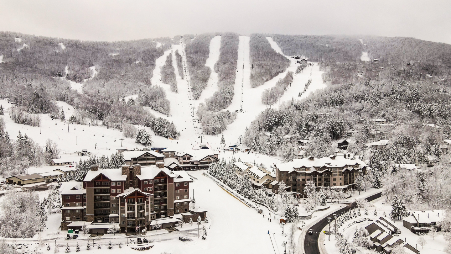 Windham Mountain in USA: a view of a ski resort in the snow.
