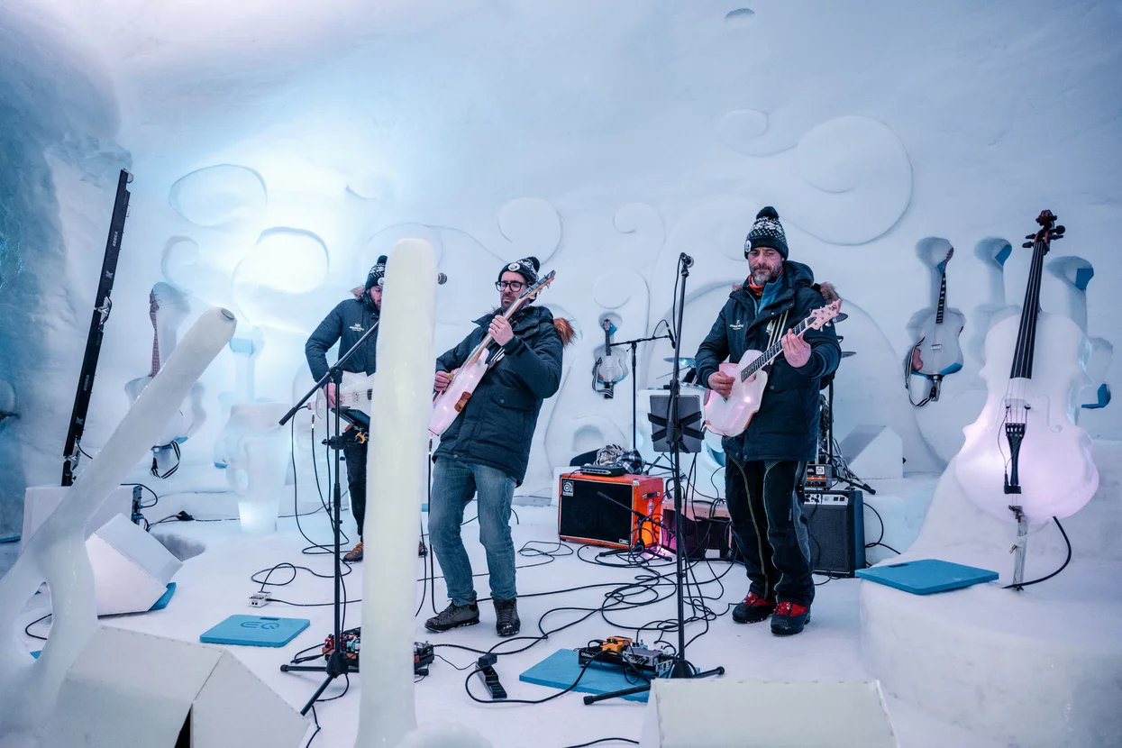 Consorzio Pontedilegno-Tonale (Ponte di Legno | ​Tonale | ​Presena Glacier Temù) in Italy - a group of musicians playing instruments in an ice cave.