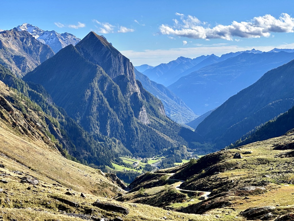 San Domenico – Alpe Ciamporino in Italy - a valley with mountains in the background.