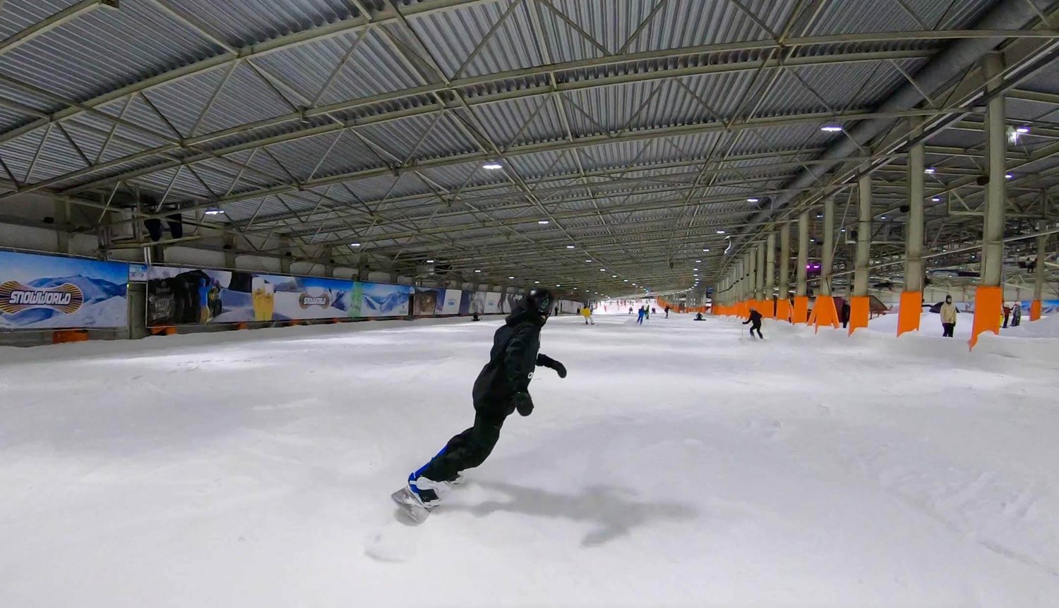 SnowWorld Landgraaf in Netherlands: a person on a snowboard in a building.