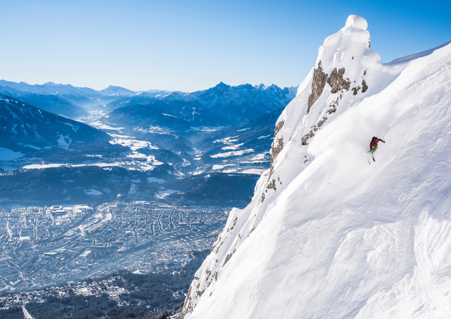 Nordkette – Innsbruck in Austria - a person on a snowboard on a mountain.