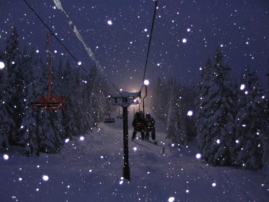 Mt Hood Skibowl in USA - a ski lift in the snow at night.