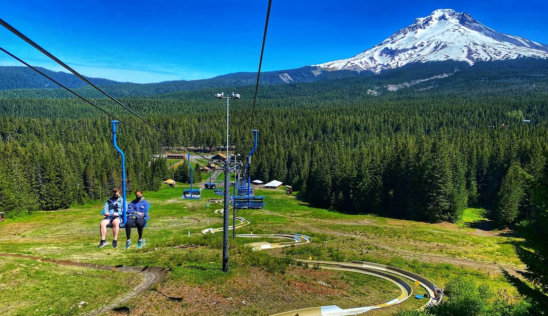 Mt Hood Skibowl in USA - a person riding a ski lift in the mountains.