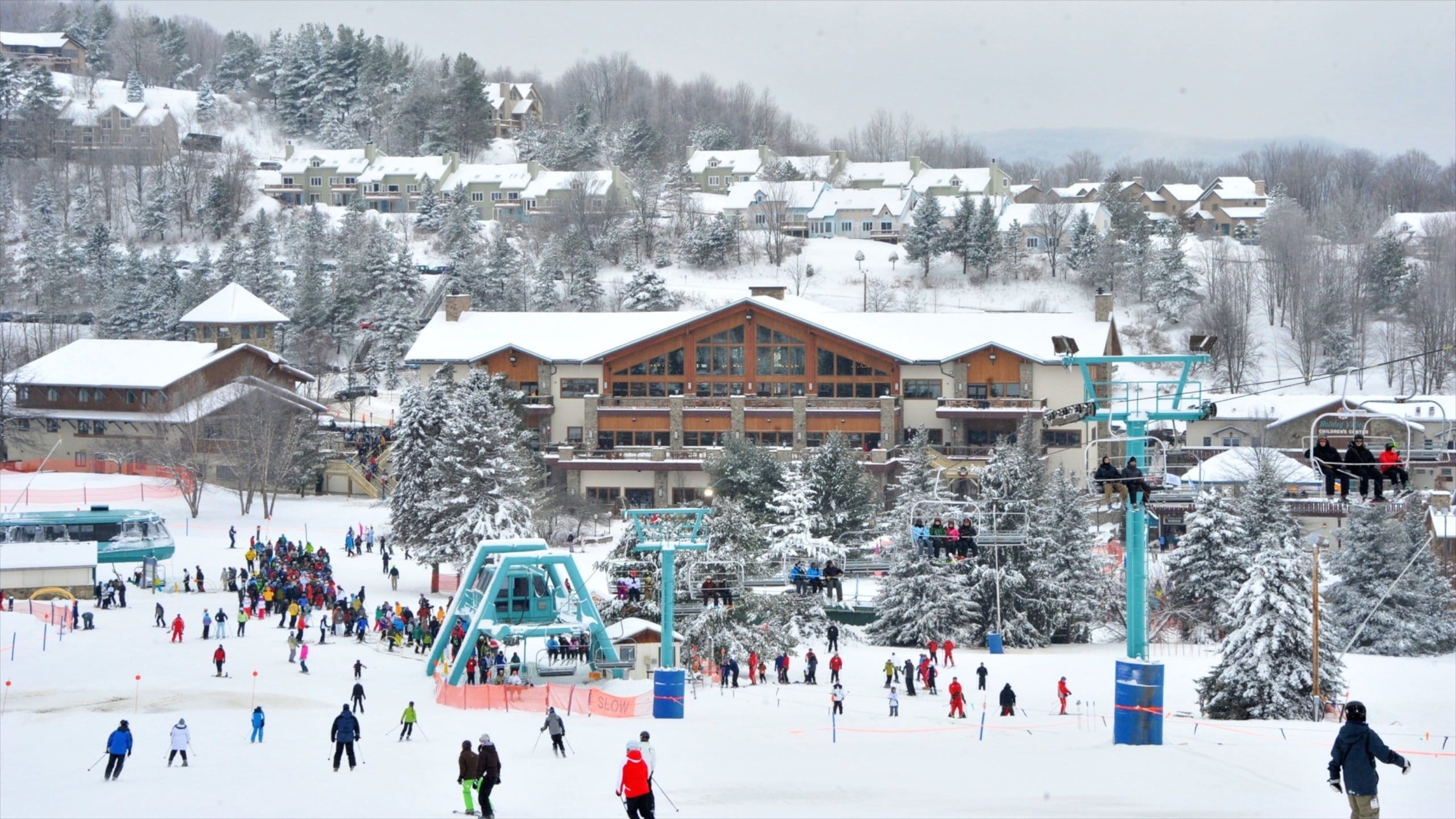 Holiday Valley Resort in USA - a group of people skiing down a hill.