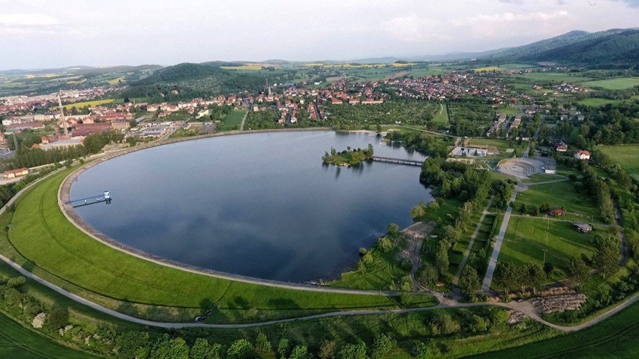 Bielawa in Poland - an aerial view of a lake in the middle of a town.
