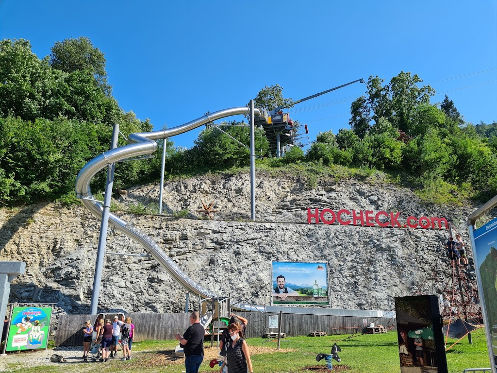 Oberaudorf – Hocheck in Germany - a group of people standing on top of a hill.
