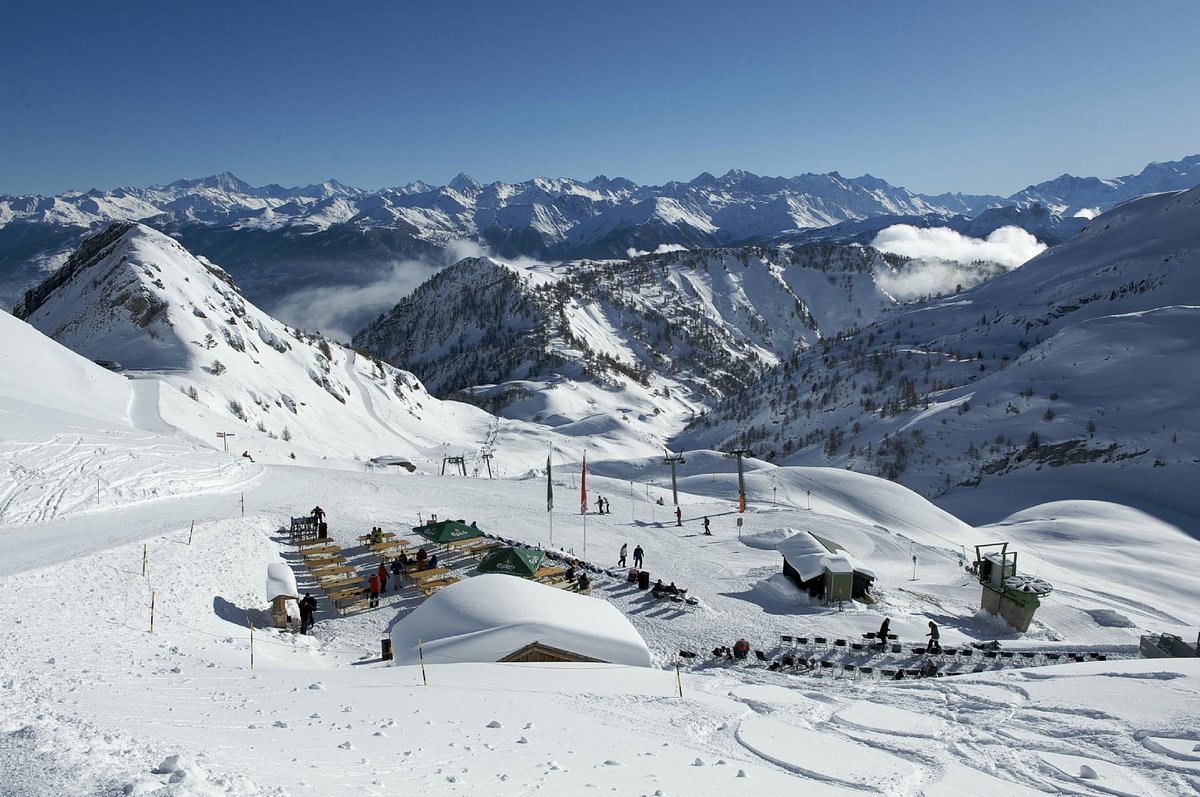 Ovronnaz in Switzerland - a view from the top of a snowy mountain.