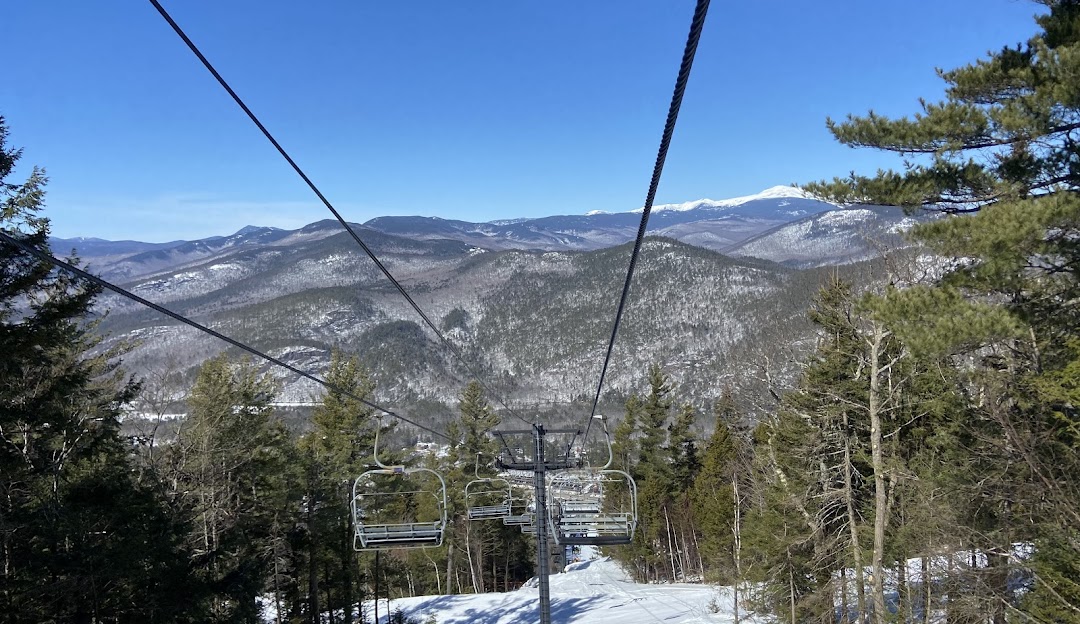 Attitash Mountain Resort in USA - a ski lift going up the mountain.