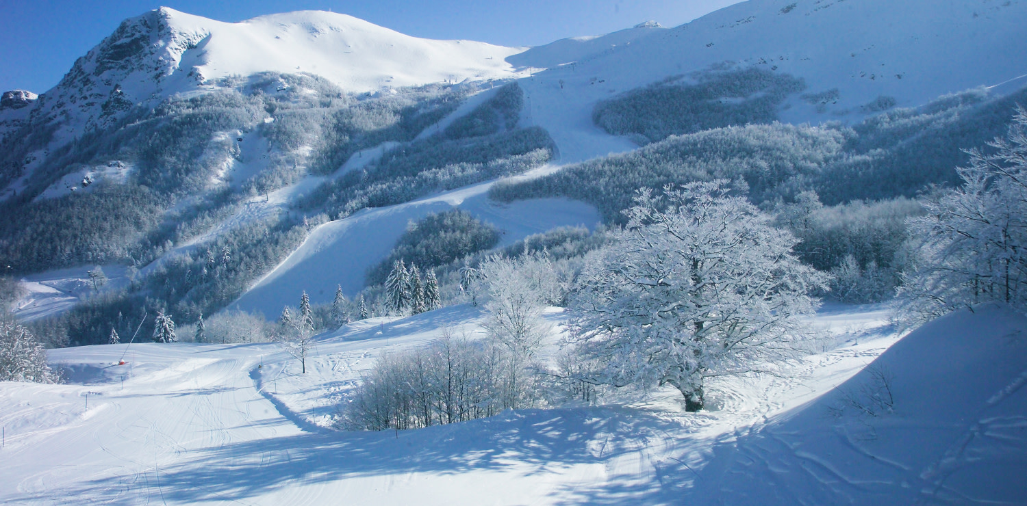 Abetone | Val di Luce in Italy - a mountain covered in snow.
