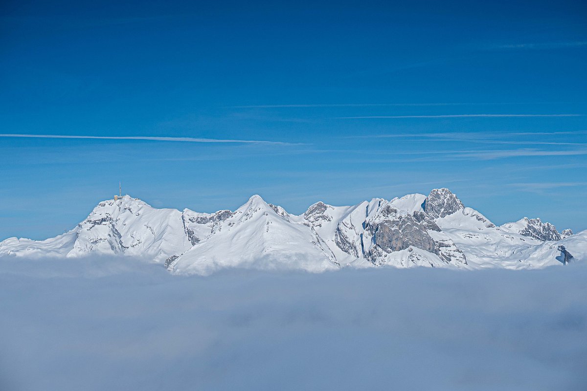 Bergbahnen Wildhaus in Switzerland - a view of the mountains from an airplane.