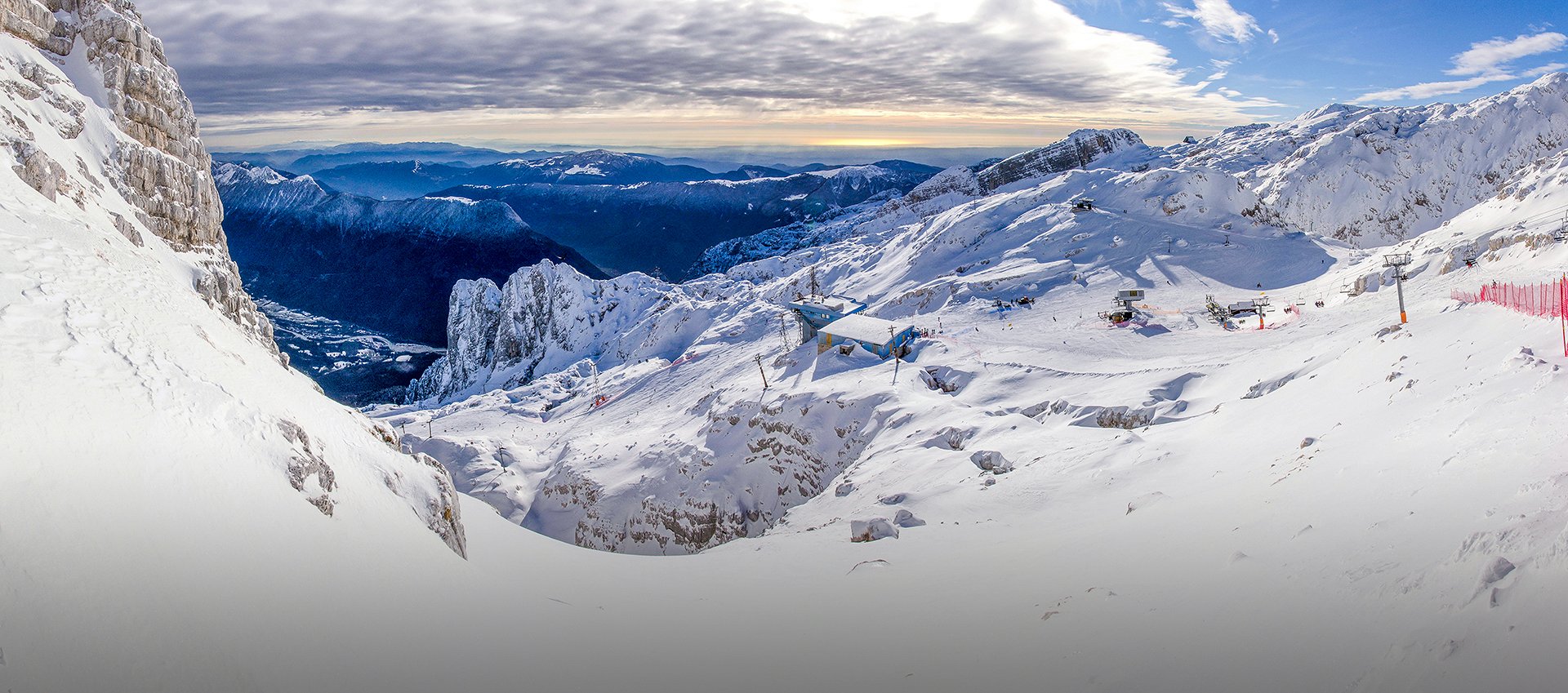 Kanin-Sella Nevea Ski Resort in Slovenia - a view from the top of a snowy mountain.