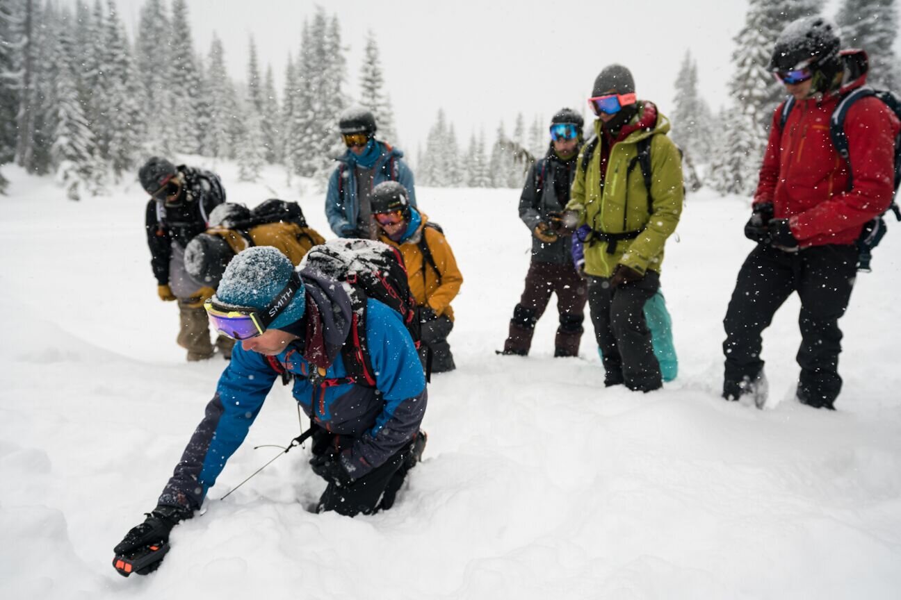 Cascade Powder Guides in USA - a group of people standing in the snow.