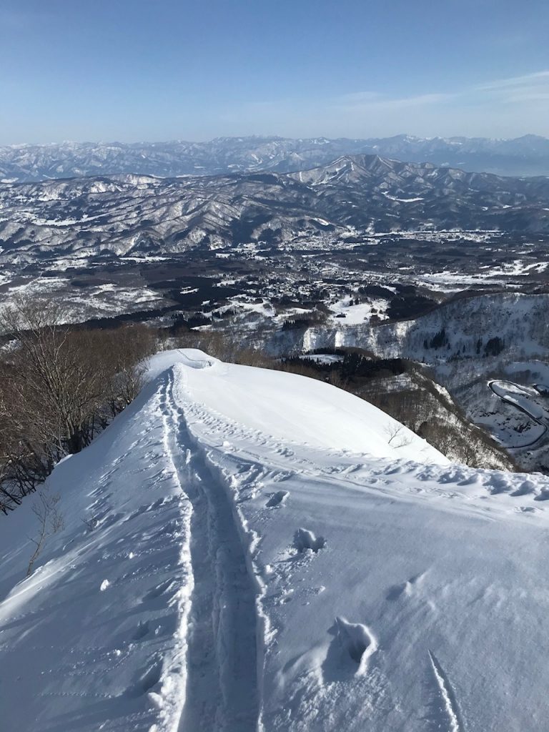 Seki Onsen in Japan - a view from the top of a snow covered mountain.