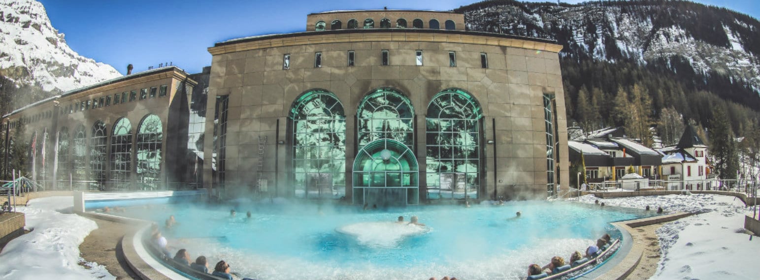 Leukerbad in Switzerland - a large pool in the middle of a mountain.