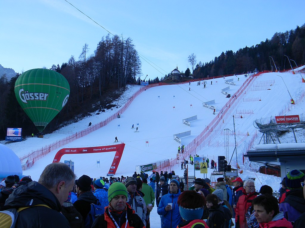Hochstein – Lienz in Austria - a group of people standing on a snow covered slope.