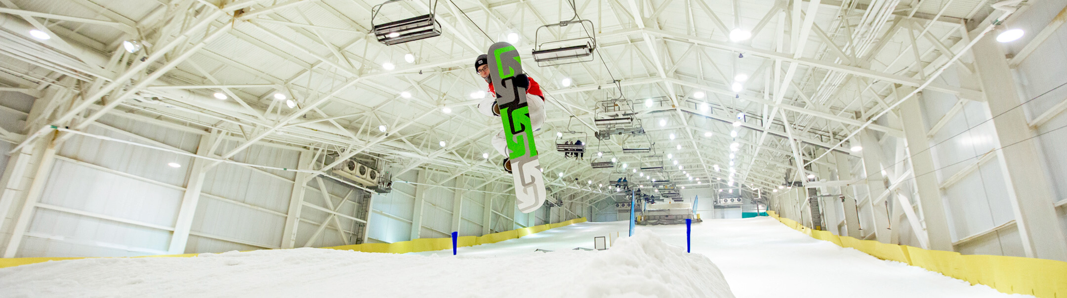 Big Snow American Dream in USA - a snowboarder doing a trick in the air.