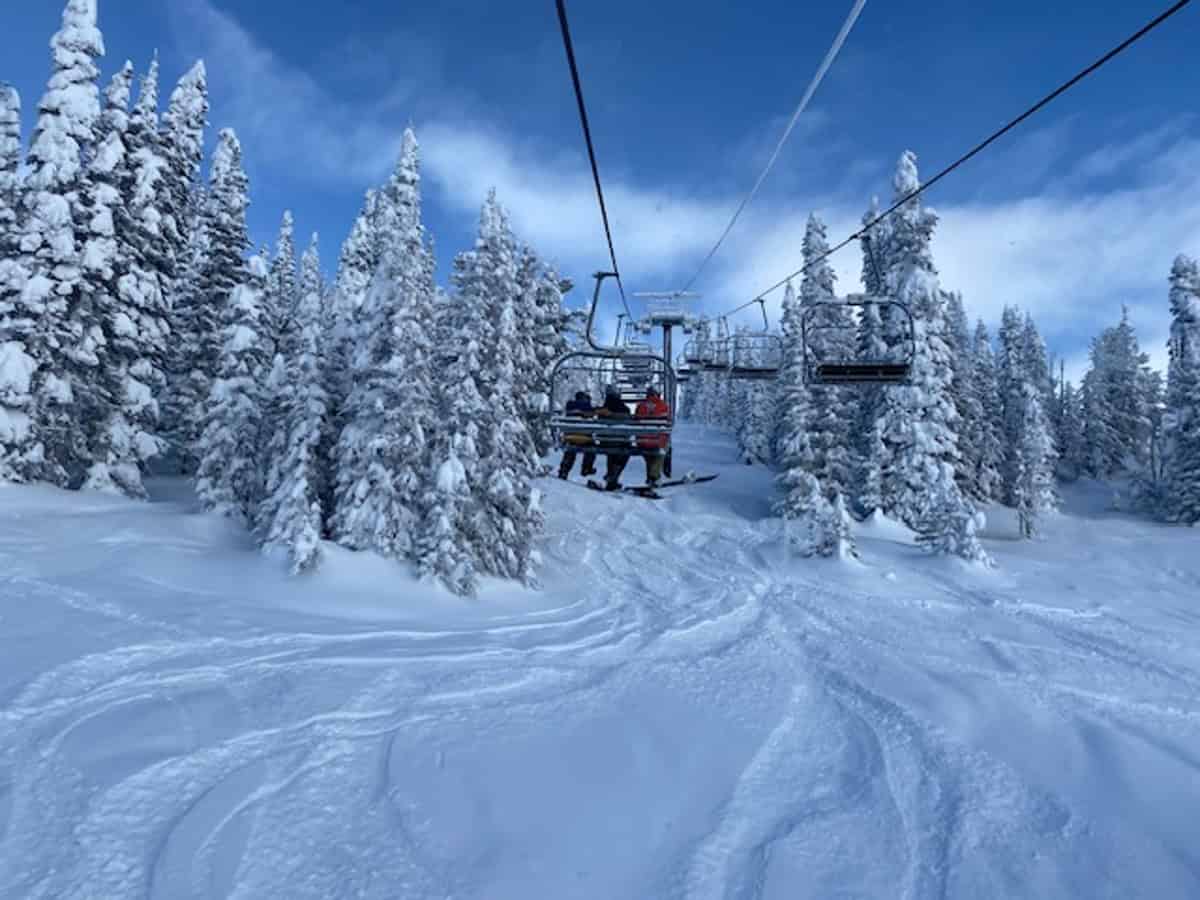 Brundage Mountain in USA - a ski lift going through a snowy forest.