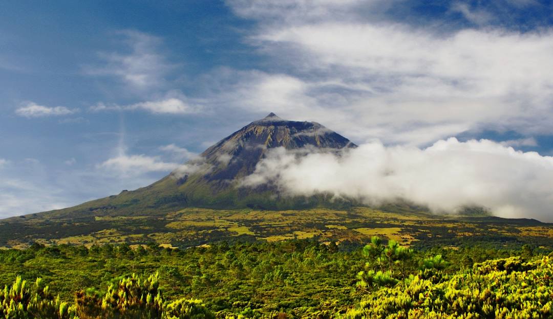 Pico Mountain in USA - a mountain with clouds in the background.