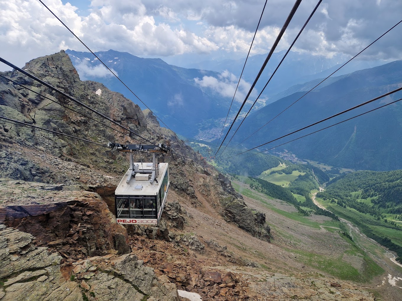 Pejo 3000 in Italy - a cable car on the side of a mountain.
