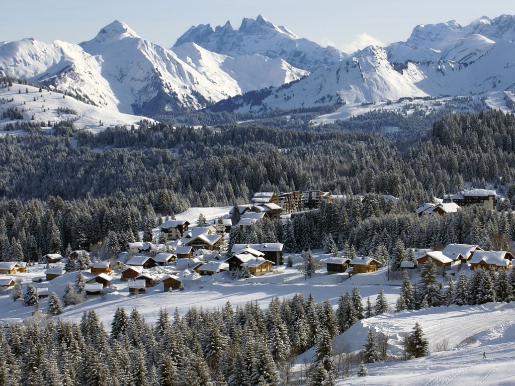 Praz de Lys Sommand in France - the mountains are covered in snow.