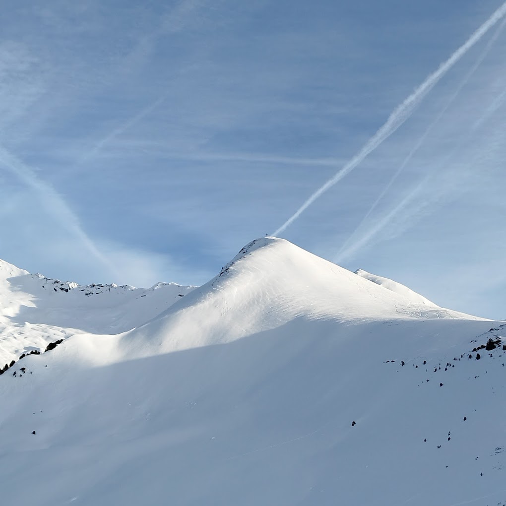 Mayrhofen Penken | Ahorn | Rastkogel | Eggalm in Austria - a person skiing down a snow covered mountain.