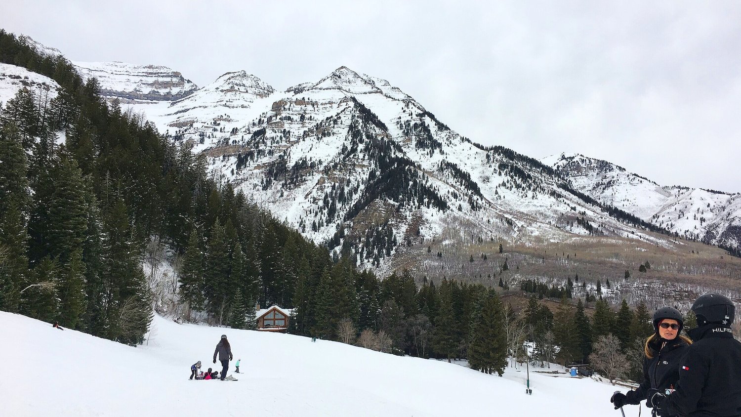 Sundance in USA - a group of people skiing down a snowy slope.