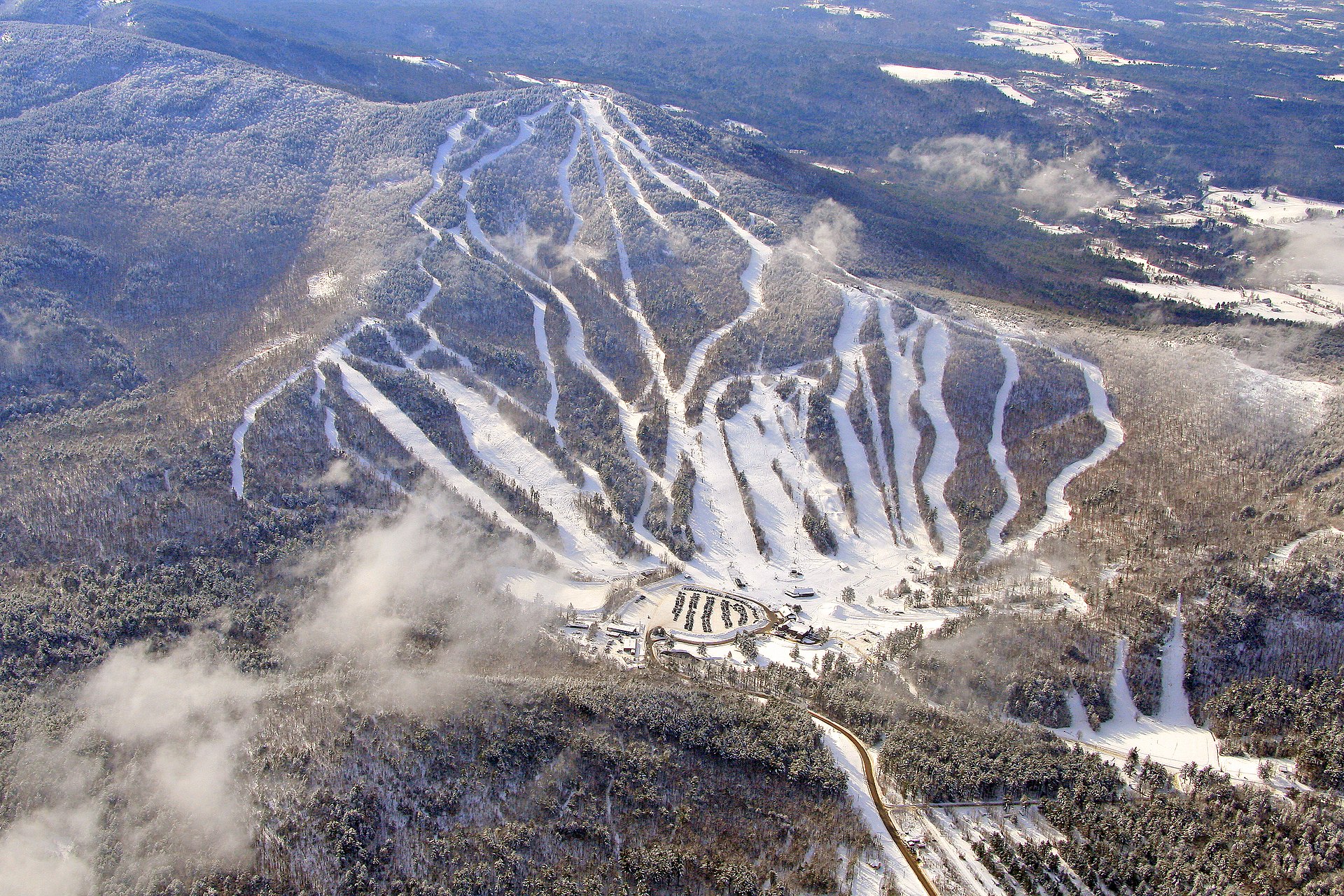 Gunstock Mountain Resort in USA: an aerial view of a ski resort in the mountains.