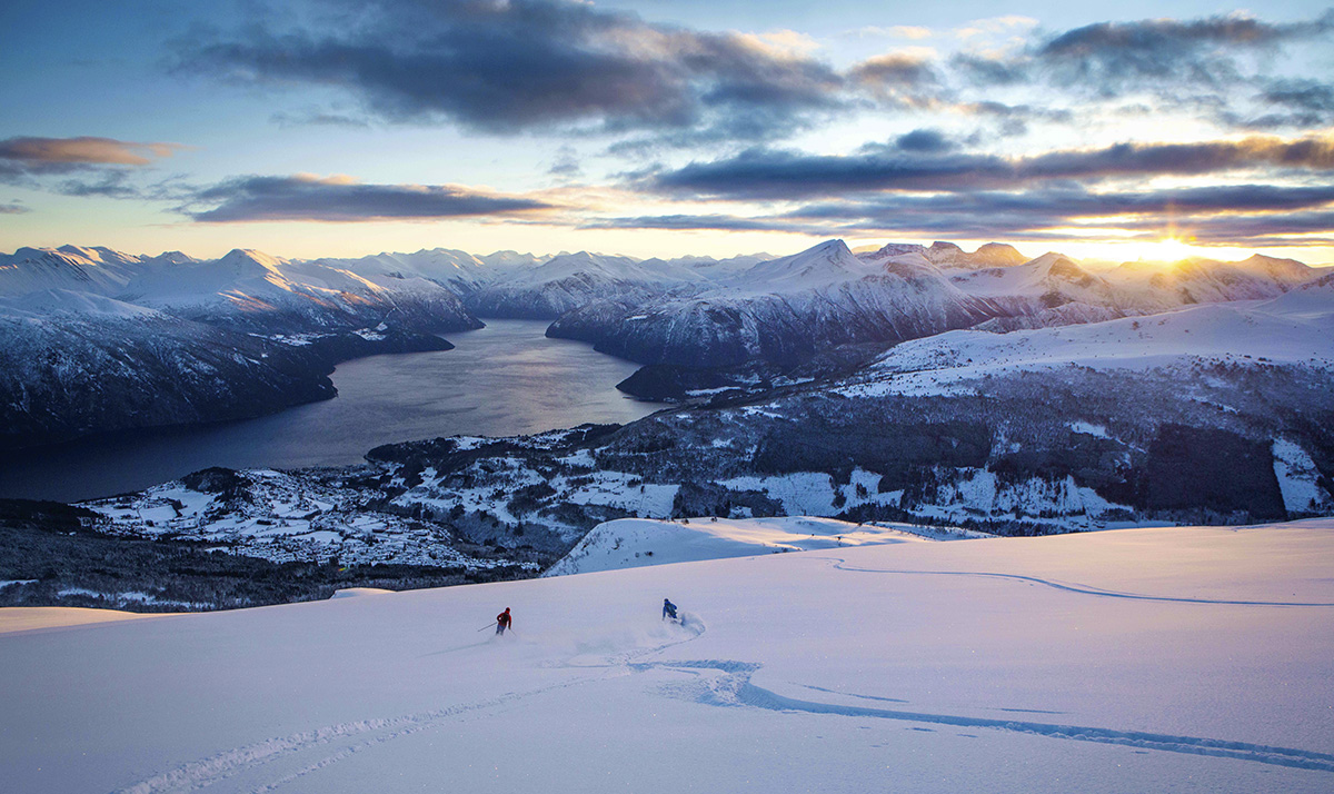 Strandafjellet Skisenter in Norway - a person skiing down a snowy mountain.
