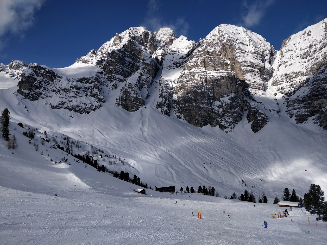 Schlick 2000 in Austria - a group of people skiing down a snow covered mountain.