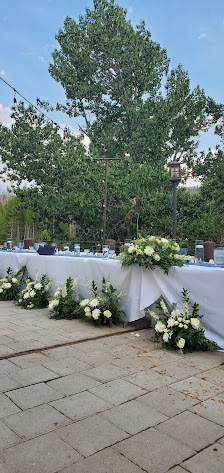 View of a charming chalet situated amongst a forest of trees at China Peak Mountain Resort, Lakeshore, California on a bright sunny day in winter.