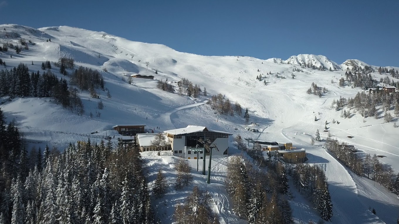 Rosskopf Monte Cavallo in Italy - a snowy mountain with a ski lift going up the side.