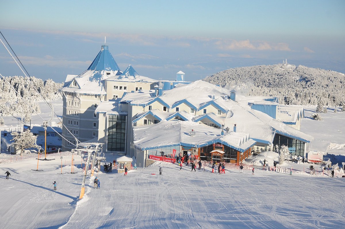 Uludag Ski Center in Turkey: a ski resort with people skiing on the slopes.