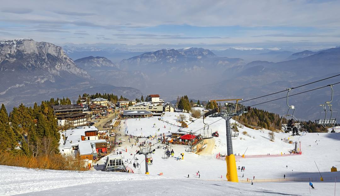 Monte Bondone in Italy - a ski slope with a ski lift in the background.