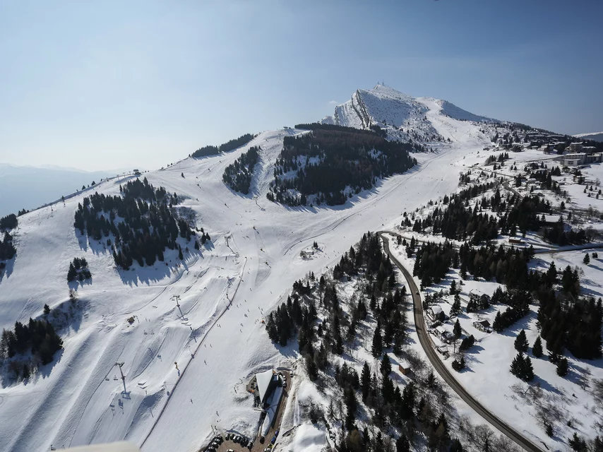 Monte Bondone in Italy - a view of a mountain with snow on the ground.
