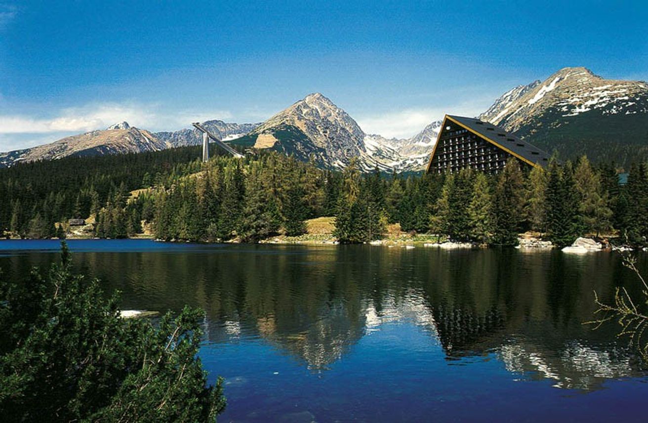 Štrbské Pleso in Slovakia - a lake with mountains in the background.