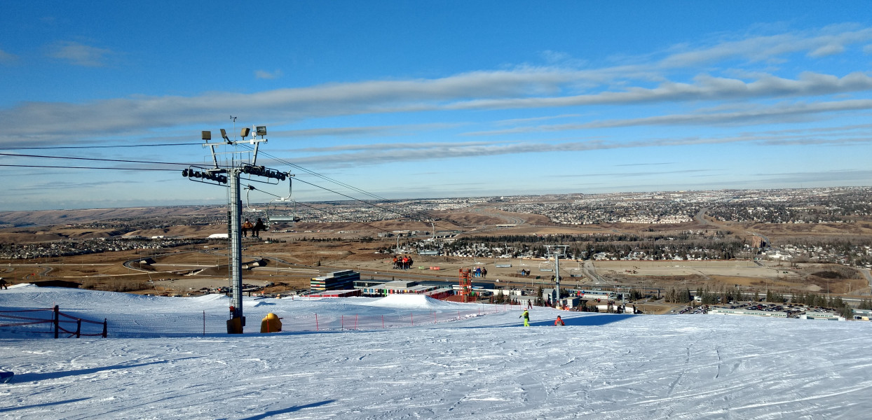 Canada Olympic Park – Calgary in Canada - a ski slope with a ski lift going up the hill.