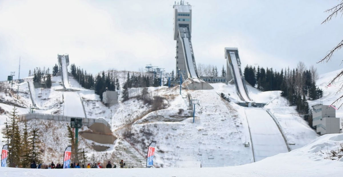 Canada Olympic Park – Calgary in Canada: a snowboarder on the slopes of a ski resort.
