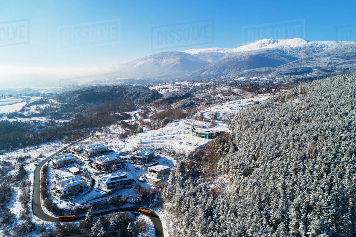 Vitosha | Aleko – Sofia in Bulgaria - an aerial view of a snow covered village in the mountains royalty - free.