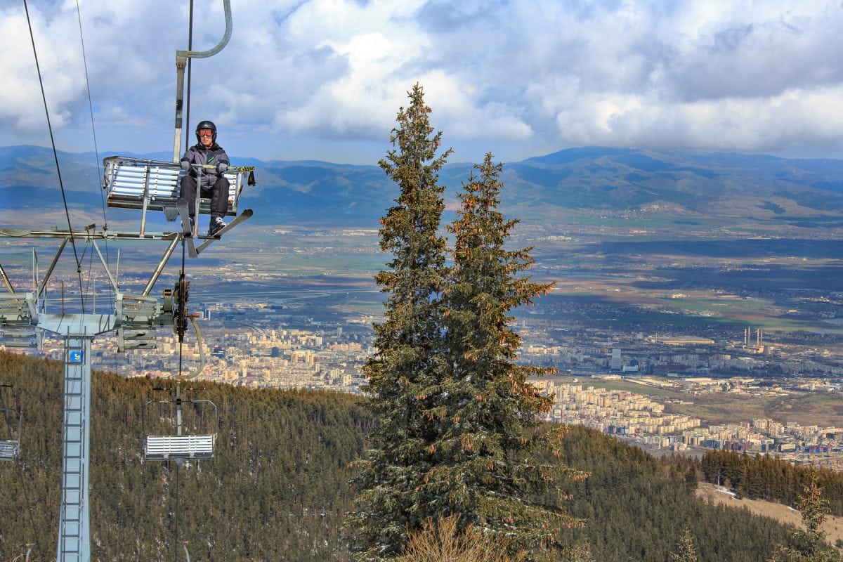 Vitosha | ​Aleko – Sofia in Bulgaria - a person on a ski lift in the mountains.