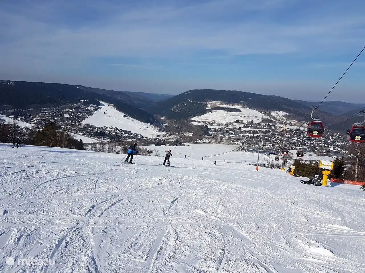 Willingen – Ettelsberg in Germany - a ski slope with people skiing down it.